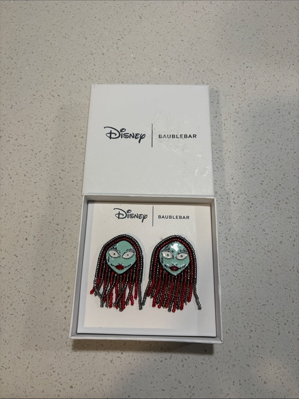 BaubleBar Disney Nightmare Sally Enamel Face Fringe Earrings - Red and Teal